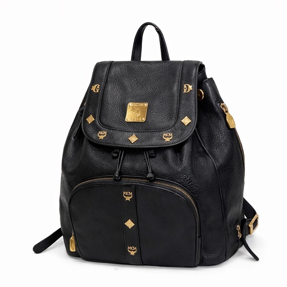 MCM Handbags - MCM Black Leather Backpack with Gold Accents